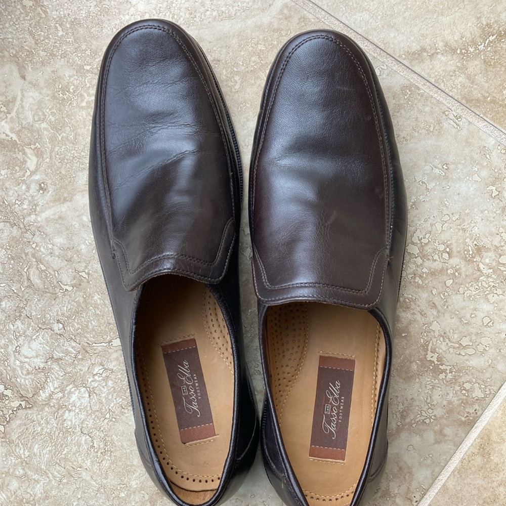 Dark brown leather men's slip on shoe. Slight wear but so comfortable.